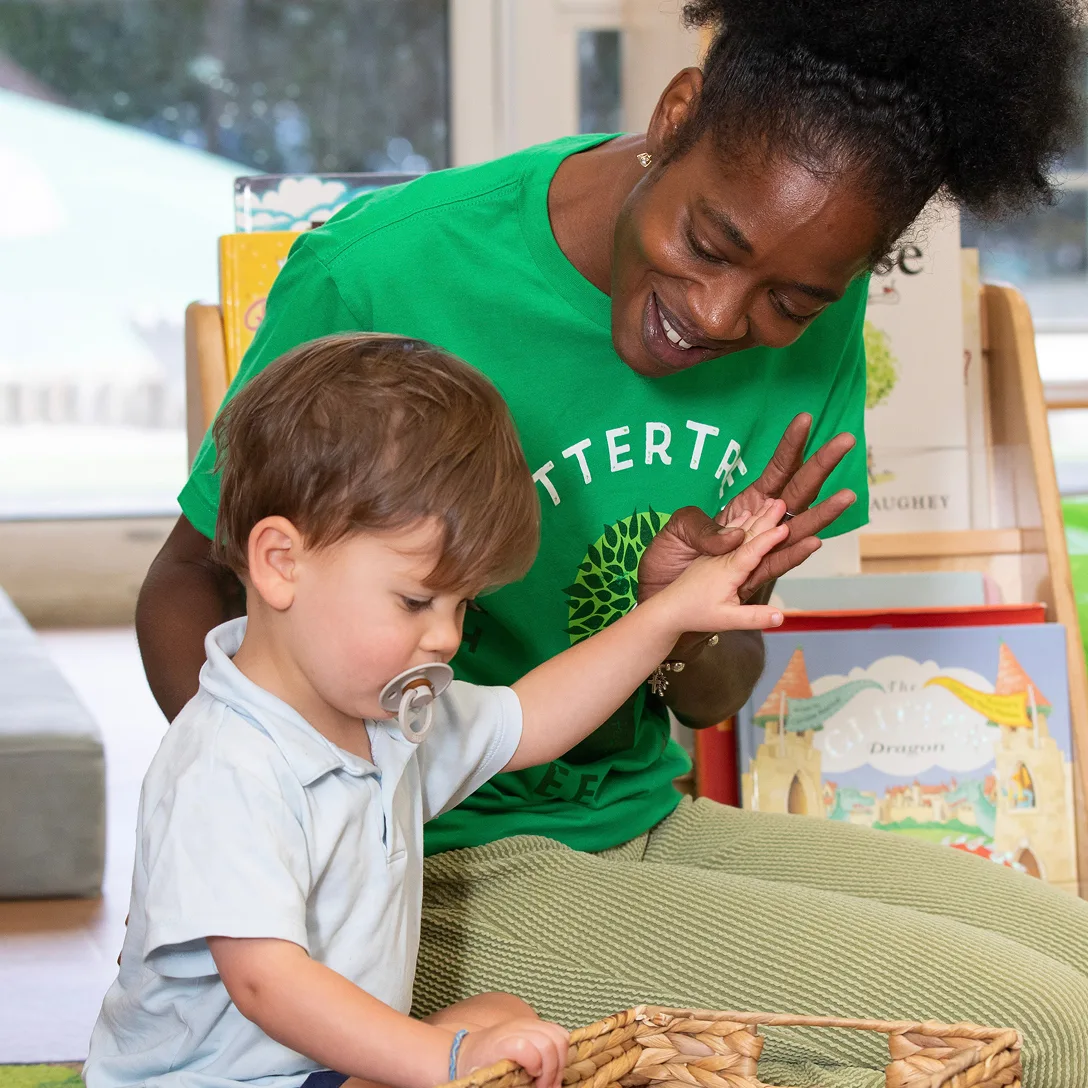 Sitter helping child